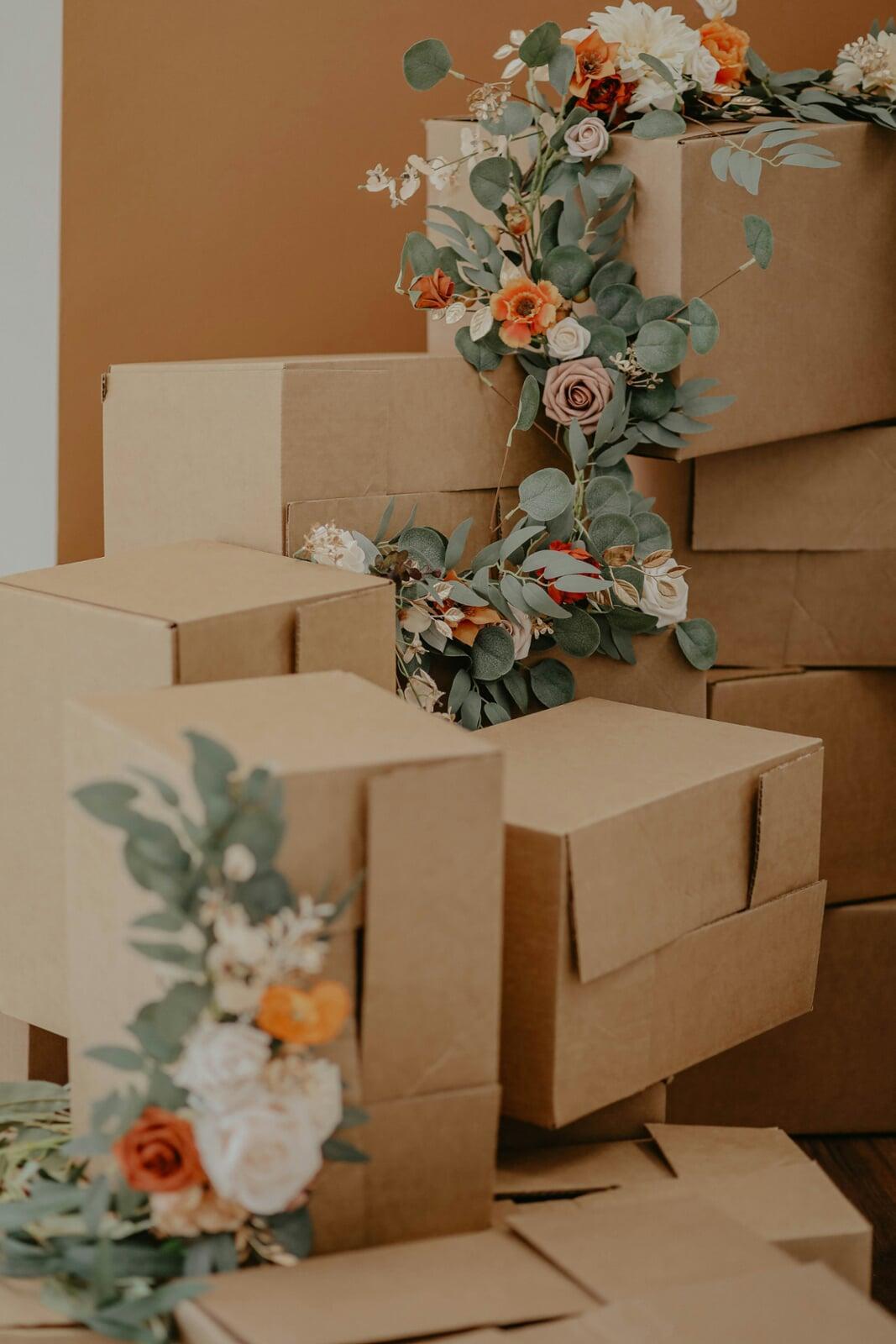 Flowers draped over wholesale boxes